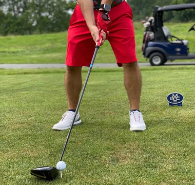 Driving-A-Golf-Ball-How-To-Be-Consistent Bite Hard