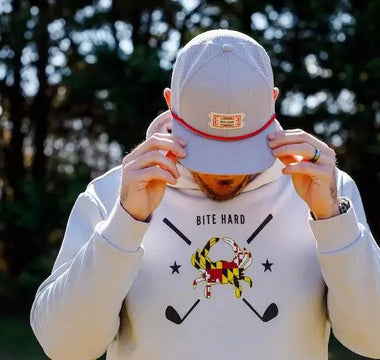 How to Dress for Any Weather: Golf Clothing Tips for Rain, Shine, and Wind